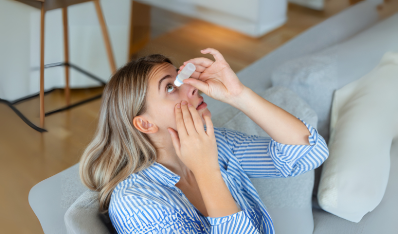 a woman use Eye Strain drops in image